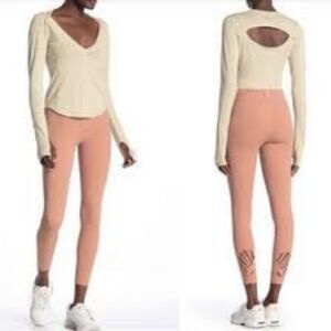 Small Free People Movement muted pink or orange tone Leggings